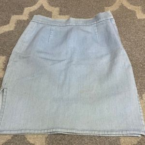 Light blue denim skirt with slits on the side